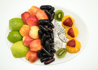 Assortment of exotic fruits isolated on white