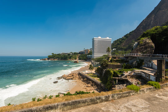 Rocky Coast of Rio de Janeiro with Mountais and Slum Vidigal