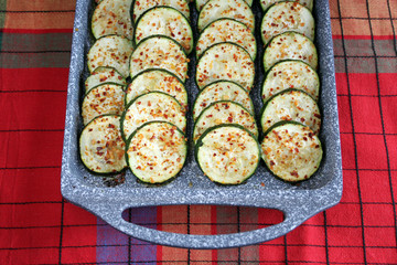 Served fresh baked spicy zucchini, sliced, marinated in olive oil