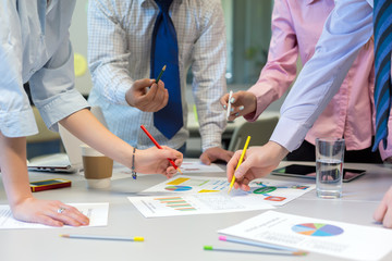 Business Team networking - office Table with Charts and People Hands