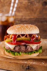 Hamburger with bacon and cheese