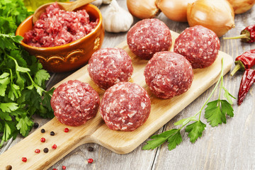 Raw meatballs on the table