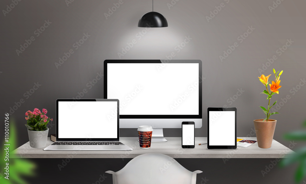 Poster Responsive devices on desk with isolated screen for mockup. Computer display, laptop, tablet and smart phone. 