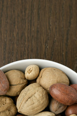 a bowl of assorted nuts