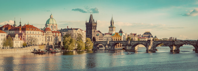 Prague, Czech Republic panorama with historic Charles Bridge and Vltava river. Vintage