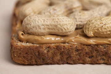 bread slice with peanut butter spread