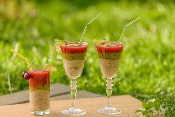 Fruit smoothie in glass wine glasses