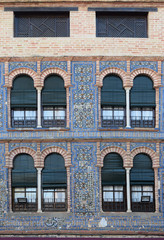 Fototapeta na wymiar facade of the Andalusia house with decorations and windows 