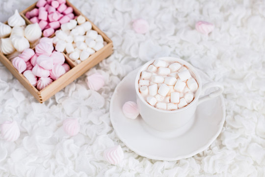 hot chocolate and marshmallow on a white background