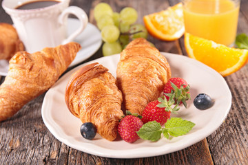 croissant with coffee and orange juice