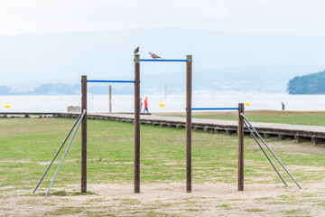Fototapeta na wymiar horizontal bar for pull-ups on the beach