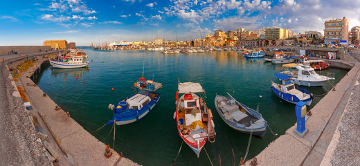 Naklejka na ściany i meble Panorama of Old harbour with fishing boats and marina in the summer sunny morning, Heraklion, Crete, Greece. 