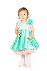 Little girl in a green dress