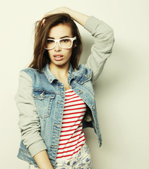 Naklejka premium Fashion portrait of young pretty hipster woman 