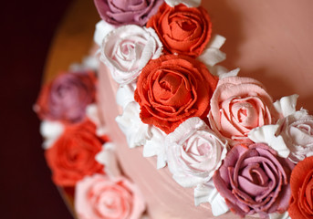 Birthday cake with red roses.