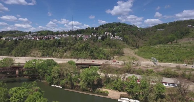 A high angle aerial view of Millvale and Route 28.  	