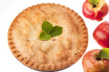 close-up of apple pie with apples.