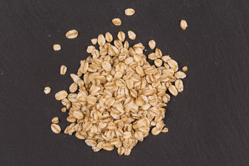 oat flakes on dark
