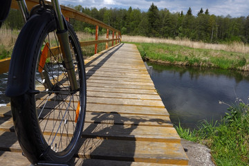 Bike bridge over river. Tourism.
