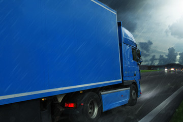 Truck on rainy highway