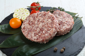 Raw burger cutlet