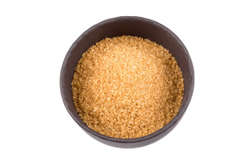 brown sugar in a dark bowl