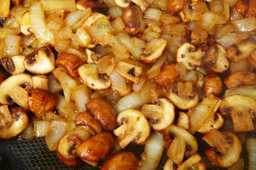Fried mushrooms in a frying pan