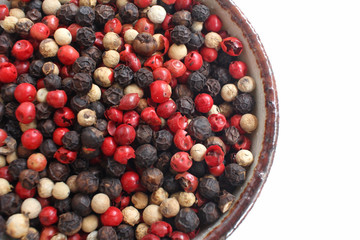 Spice of colored peppers ball isolated