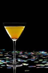 orange drink with confetti