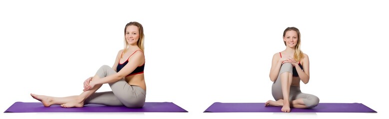 Fototapeta premium Young female doing exercises on white