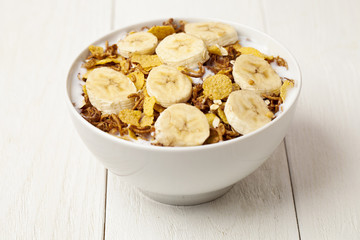 close up cereal bowl with slice bananas