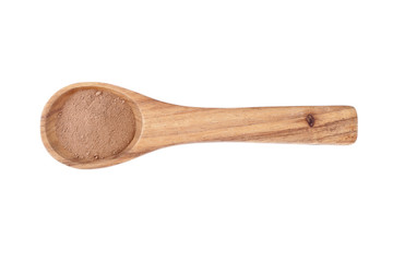 wooden spoon with chocolate powder