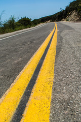 Double yellow line on empty road