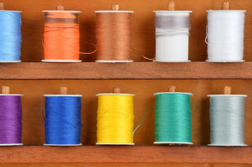 Threads on wooden box