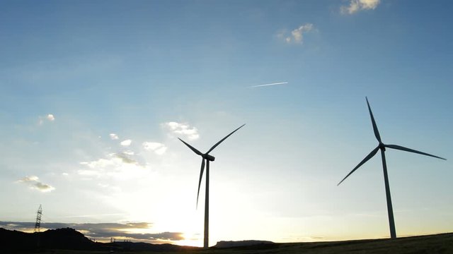 Wind turbines moving at crepuscule