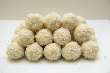 Sweet balls showered with a coconut shaving