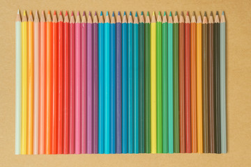color pencils on craft paper background


