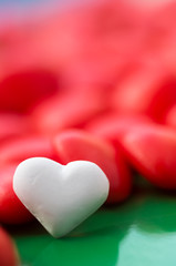 Obraz premium Heart shaped italian sweets, confetti