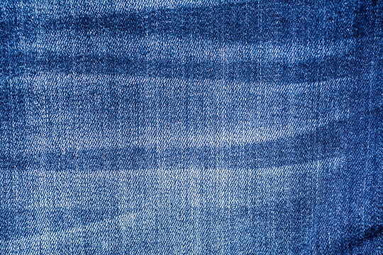 Blue jeans material texture background close up
