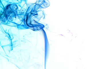 Abstract blue smoke from aromatic sticks.