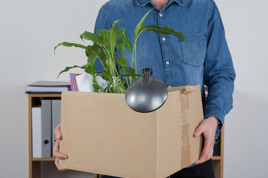 Man Carrying Box Beacause He Is Layoff