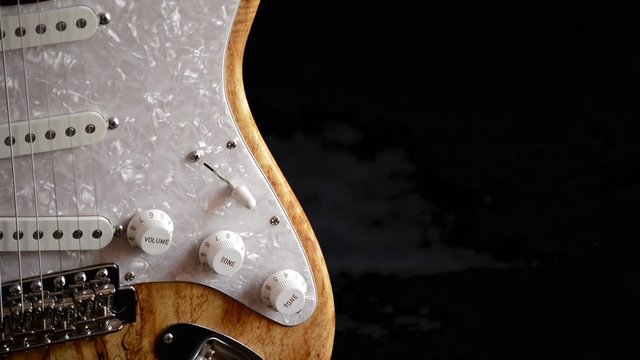 Body of electric guitar turning