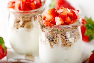 Strawberries desert with cream and cereals