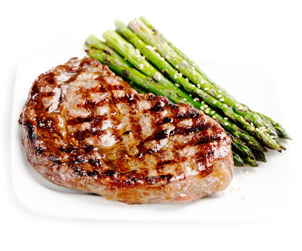 Barbecue grilled beef steak meat with asparagus