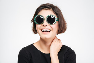 Laughing woman in sunglasses