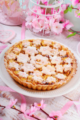 homemade apple pie with cut out spring flowers