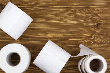 Toilet paper on wooden board