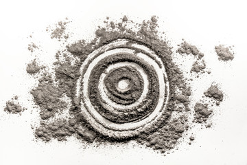 Bullseye, target, round, circle shape drawing in dust, ash, dirt