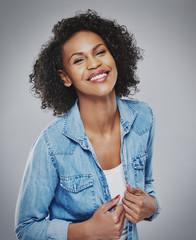 Pretty laughing woman in blue denim