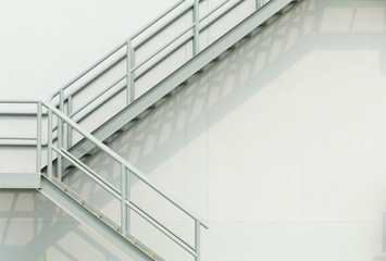 Fire escape ladder on the side of building 